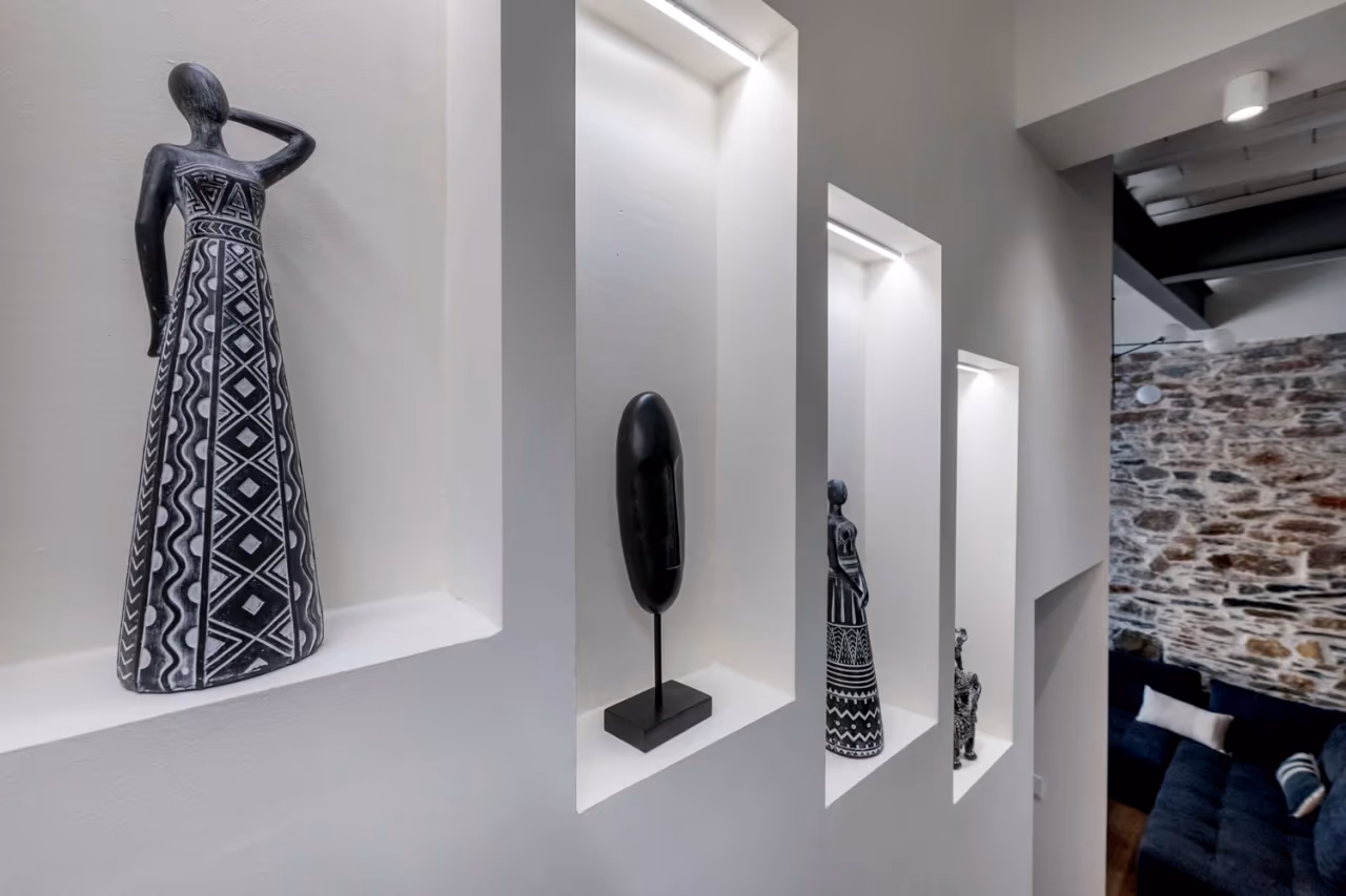 Display niches beside the staircase and living room