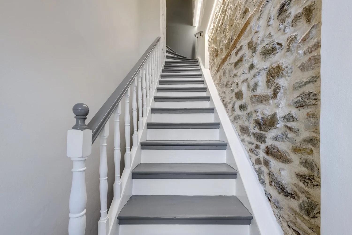 Stone-lined stairway inside the home