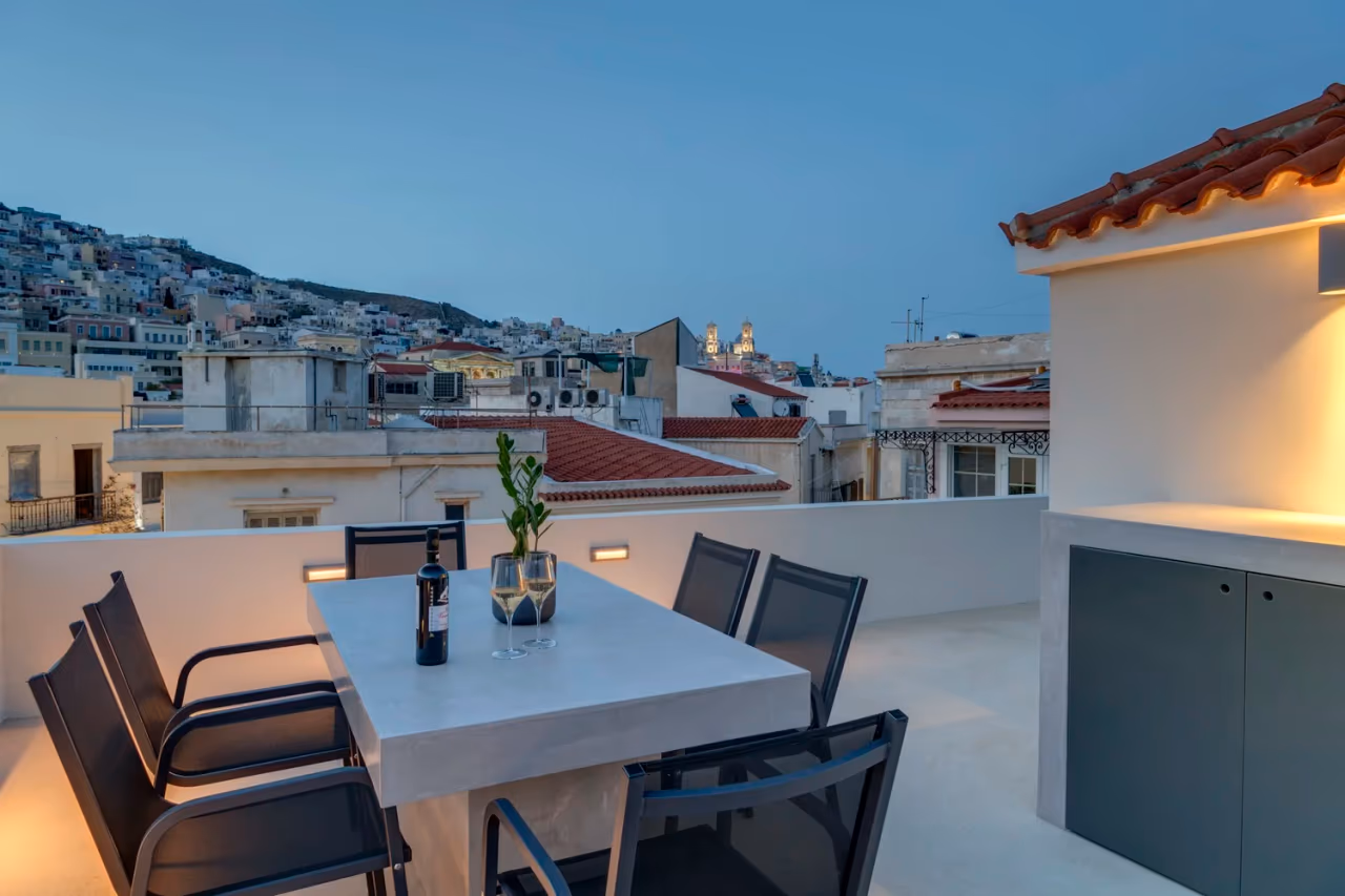 Dusk view over upper Ermoupolis from the terrace