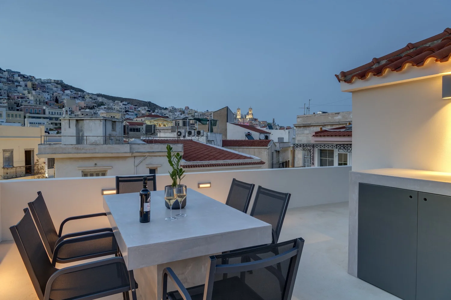 Dusk view over upper Ermoupolis from the terrace